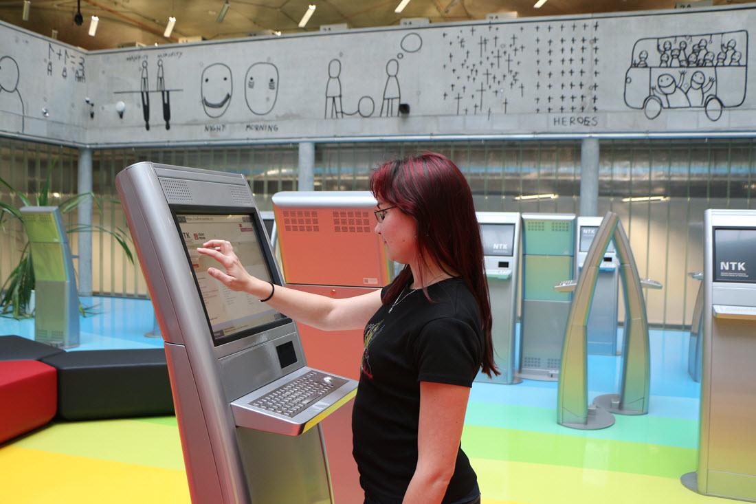 Use computers and kiosks in the library...